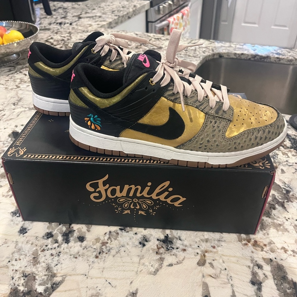 Nike Familia Gold and Black low dunks